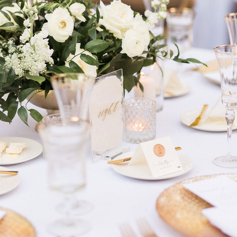 Ivory, gold and crystal table setting
