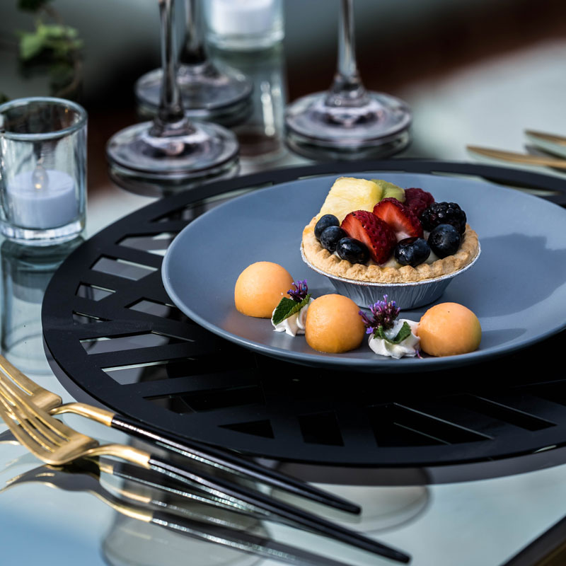 black deco charger with gray-blue plate