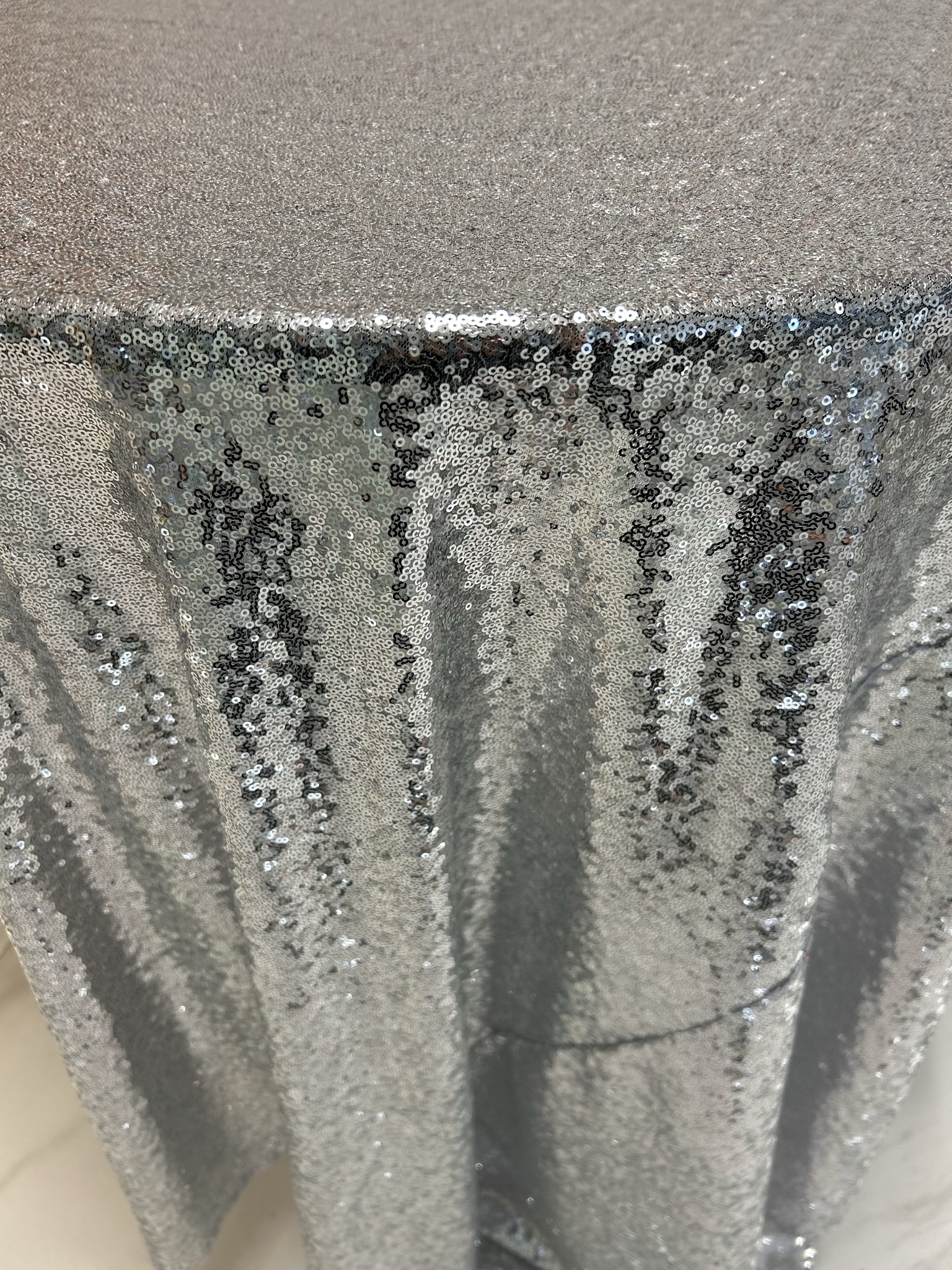 Silver sequined overlay